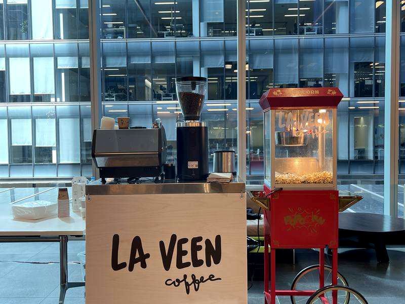 La Veen popcorn cart set up beside the coffee cart